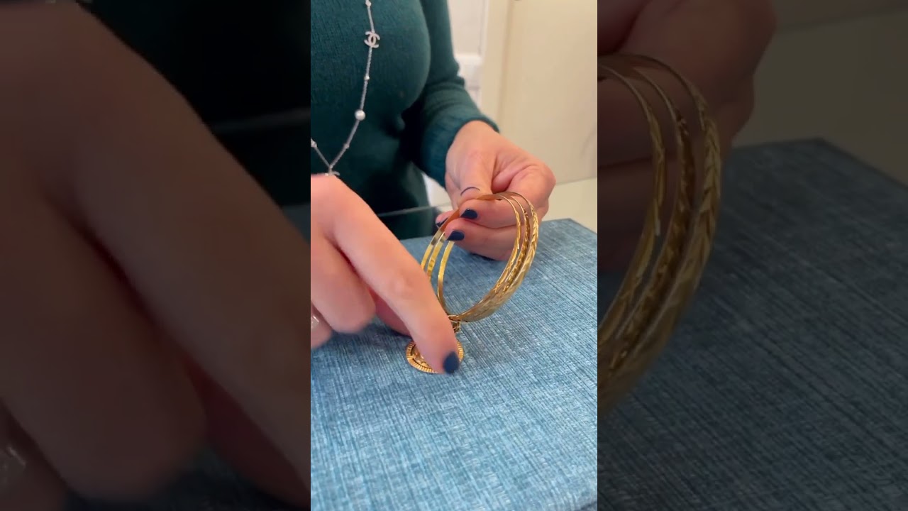 Bracciale vintage rigido con pendente in oro 18k