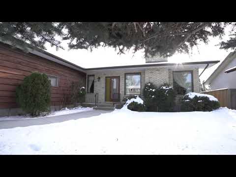 Timeless Charleswood Brick Bungalow