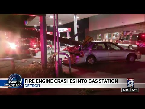 Fire engine crashes into gas station
