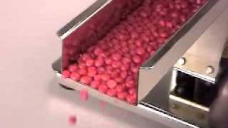 Dispense by weight or constant feed rate.