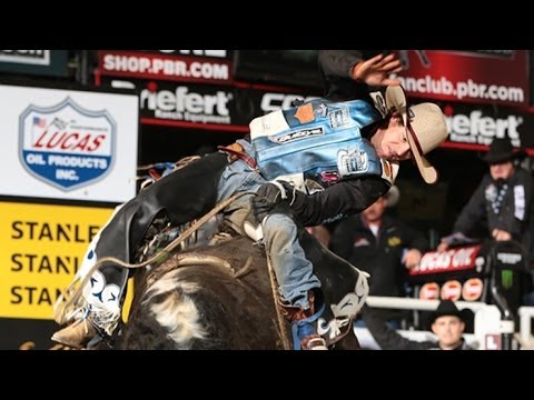 WRECK: David Scott Mason takes a hit in the chute from Hustle Up (PBR)