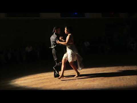  Cristina Ladas  and  Homer Ladas  are  dancing  to  a  nontraditional song  at  England International Tango Festival  in  2018