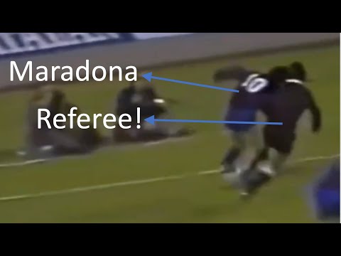 Referee Pushing Maradona to Stop Him!