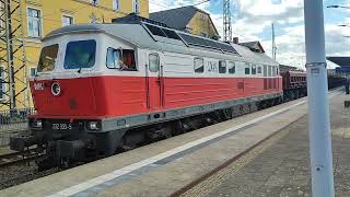 Ausfahrt BR 232 333-5 WFL mit einem Schotterzug im Schlepptau