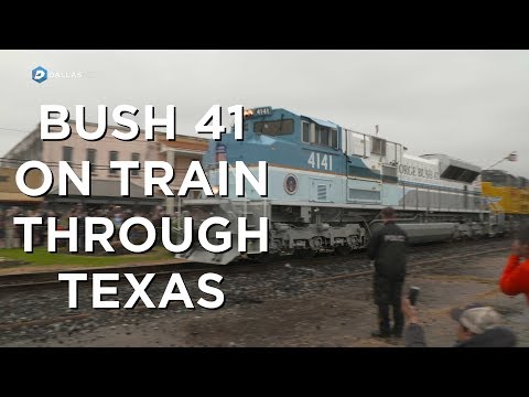 People come from miles to train carrying President George H W Bush