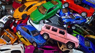 Metallic paint on these model cars make them very colourful*