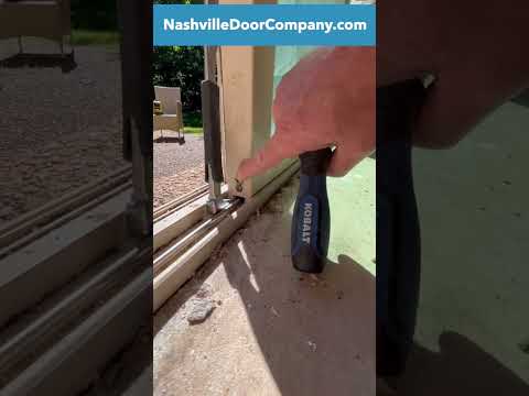 Part of a video titled How to fix and adjust sliding patio door wheels Part 1 - YouTube