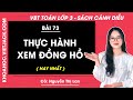 Vở bài tập Toán Lớp 3 Bài 73: Thực hành xem đồng hồ