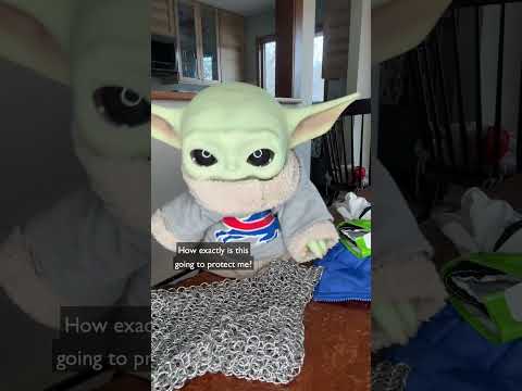 Grogu changes into his Mandalorian armor