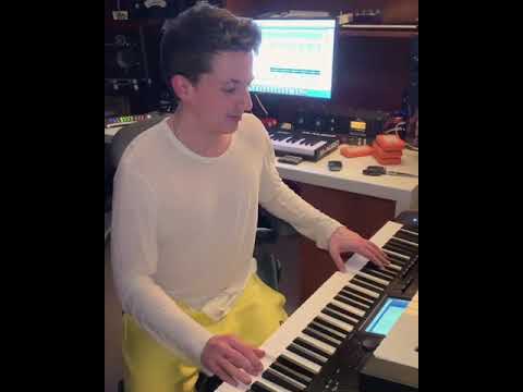 Charlie Puth playing  different random hit songs