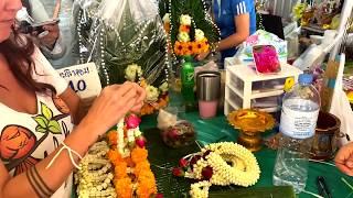 Making a Garland in Bangkok Yodipman Flower Market