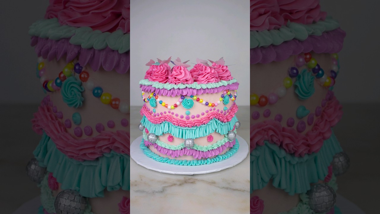 How cute are these chocolate disco balls!🕺#cake #isitcake #taylorswift #erastour #discoball #shorts