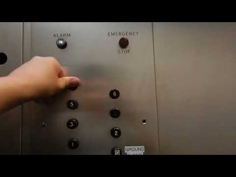 Miracle in motion: Otis black button Traction elevator at 414 Lonsdale Street, Melbourne, VIC