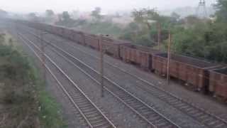 preview picture of video 'Very Long Coal Train at Raniganj. slow speed and also using Light for stationmaster Indian Railway'