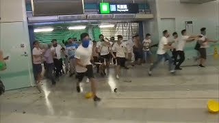 video: Anger in Hong Kong over 'triad attack' on anti-government protesters