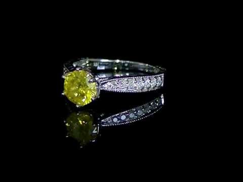 1.35 CT T.W. SI1 CANARY YELLOW ROUND DIAMOND RING IN 14K WHITE GOLD