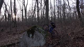 7 foot tall A frame rock is right next to the existing singletrack trail. Speed and commitment are your friend, as is a good chainring protector.