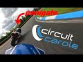 Husqvarna 701 Vs Ducati Panigale On Racetrack