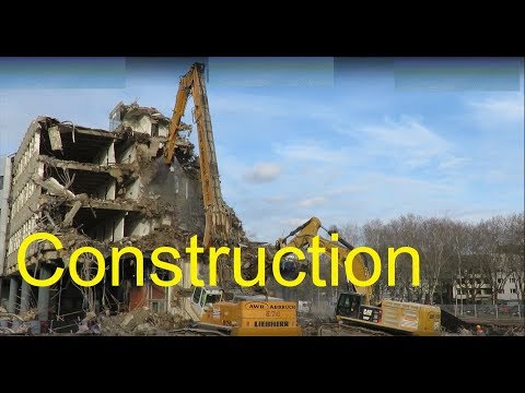Excavator Liebherr 974 and CAT 390 huge demolition site