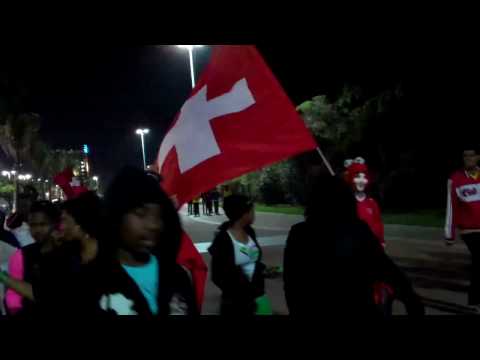 Swiss fans before & after victory over Spain