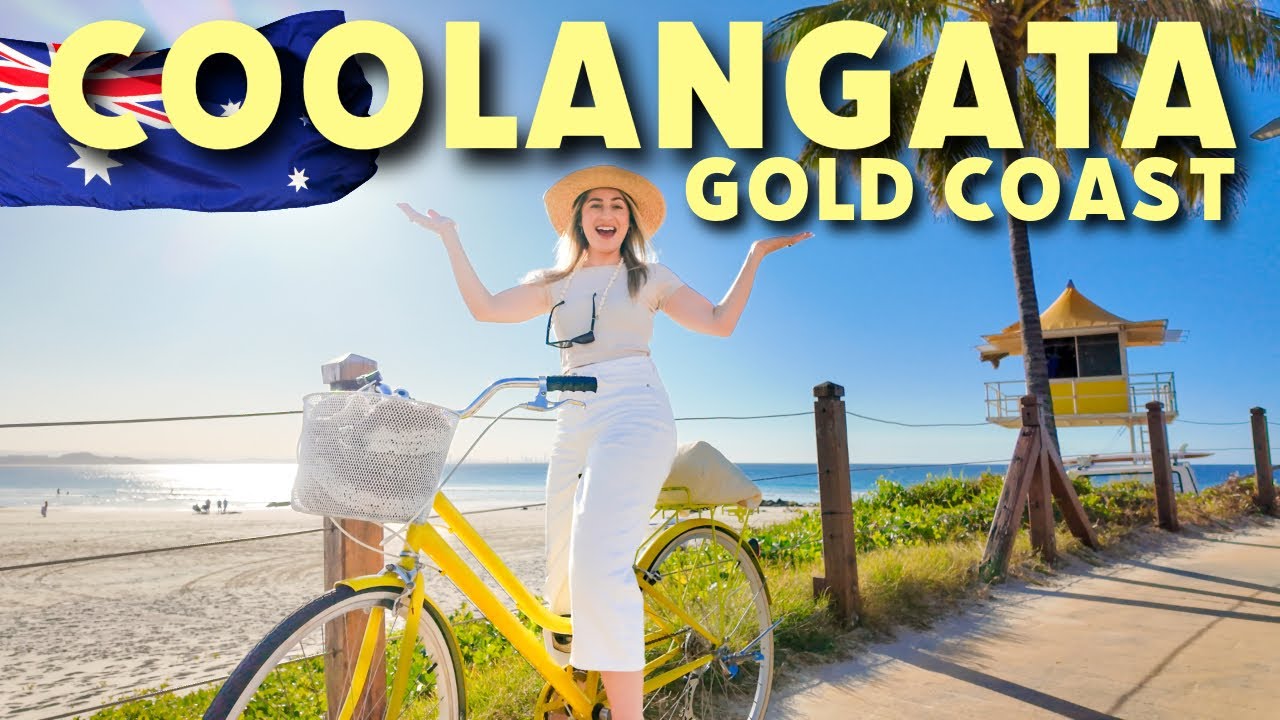 Join travelers as they explore Coolangatta and its beach.