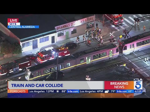 Metro train and vehicle crash in South L.A.