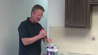 How to Remove a Plastic  Lid Lock on a Paint Can - Armlok or Normlock Paint Can Lid Lock