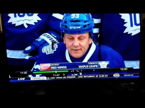 Lanny McDonald photobombing  Red Wings Alumni team picture