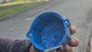 Replacing distributor cap, rotor and distributor pick up coil in Dodge Ram.