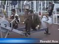 Mr. Bean rowing