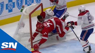 Dylan Larkin Drives The Net And Barrels Into Jake Allen Knocking His Helmet Off