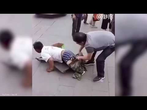 This beggar is is faking amputation!