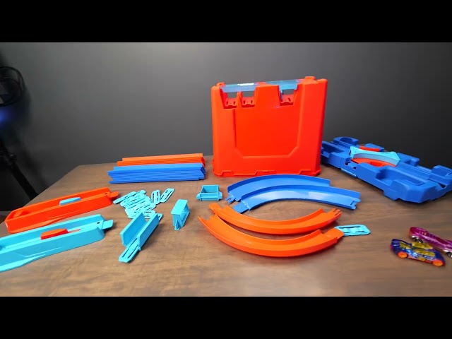 Vídeo relacionado con Hot Wheels - Track Buider Caja de Acrobacias Deluxe (Mattel GGP93) + Wheels - Pack De 20 Vehículos con Embalaje de Cartón, Coches de Juguete (Modelos Surtidos) (Mattel DXY59)