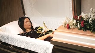 PREPARING A DEAD BODY IN THE CASKET