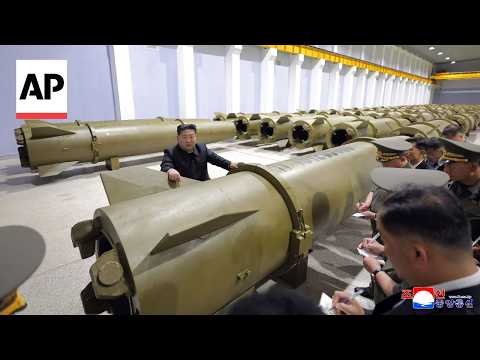 Photos: North Korea's leader Kim Jong Un tours missile factory