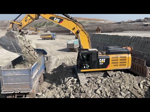Caterpillar 352F Excavator Loading Trucks