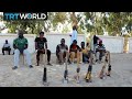 Migrants In Libya Dangers At Sea Force Some To Make Home In Libya