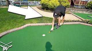 DOING WHATEVER IT TAKES FOR A MINI GOLF HOLE IN ONE!