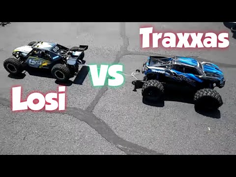 Traxxas Xmaxx vs Losi Desert Buggy XL-E 4WD in a tug of war..lol