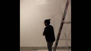 Pat covering Troy Lovegates Mural