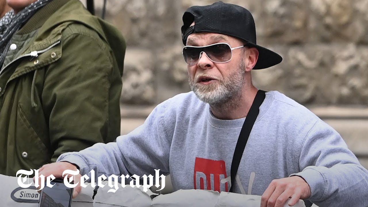 Watch Prince Harry heckled by East 17 singer Brian Harvey outside court