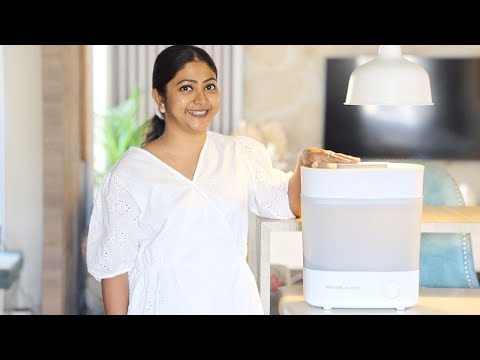 Part of a video titled How I sterilise my baby's essentials with Philips Avent Sterilizer - YouTube