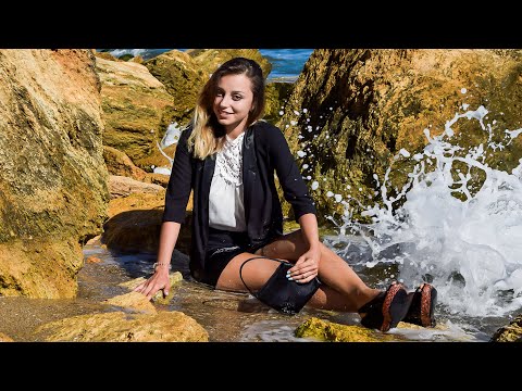 TEMPTING GIRL AFTER OFFICE WORK POSES AND RELAXES IN WET OFFICE CLOTHES ON THE SEASHORE