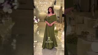 فستان سهرة بتصميم درابيه وتطريز على الصدر