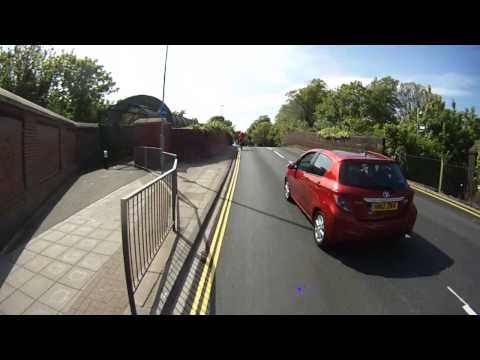 HN12ZRA - Overtakes Two Cyclists On Blind Crest