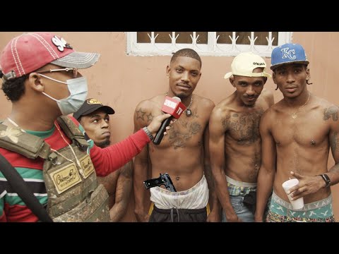 I go into the favela called Isabelita's hole with Jeison the monkey.