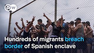 Migrants storm Ceuta to get into Europe | DW News