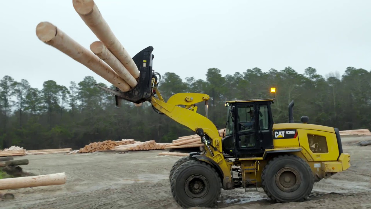 Cat® Millyard Forks and 938 Small Wheel Loader at Work