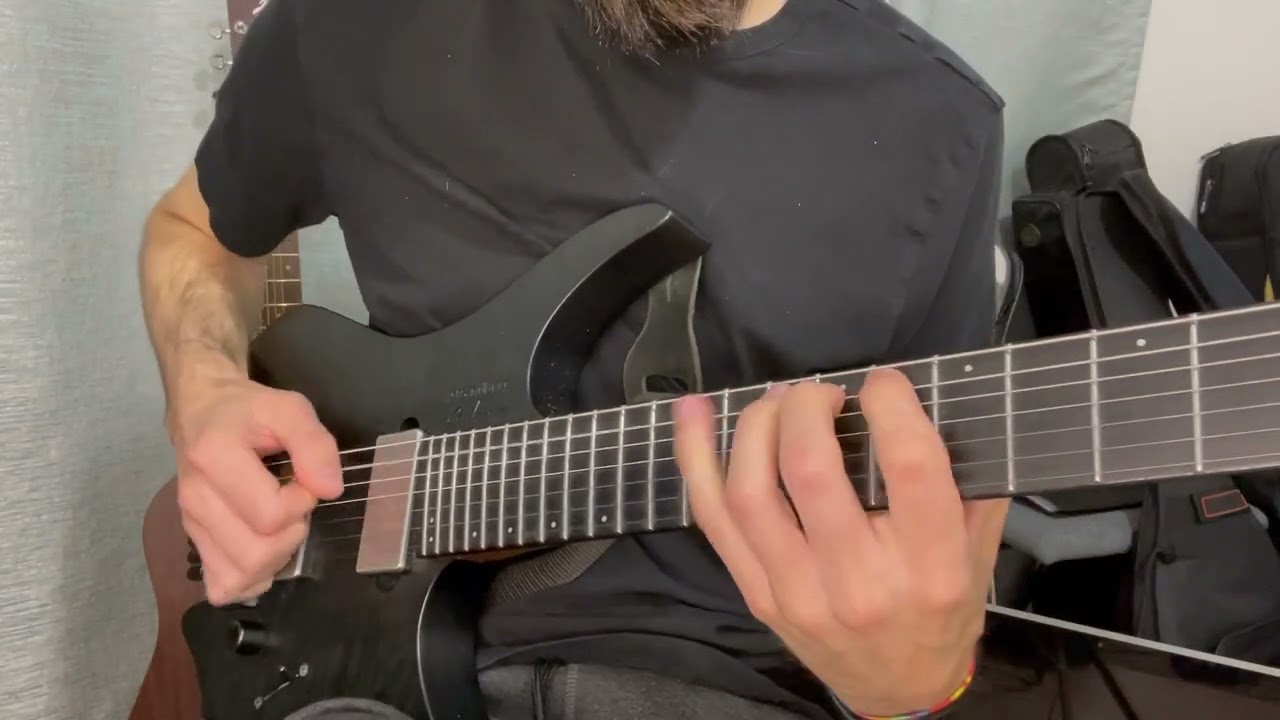 Electric guitar fretboard close-up during a fast chromatic Dream Theater run
