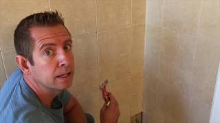 How to repair cement board behind damaged shower tile